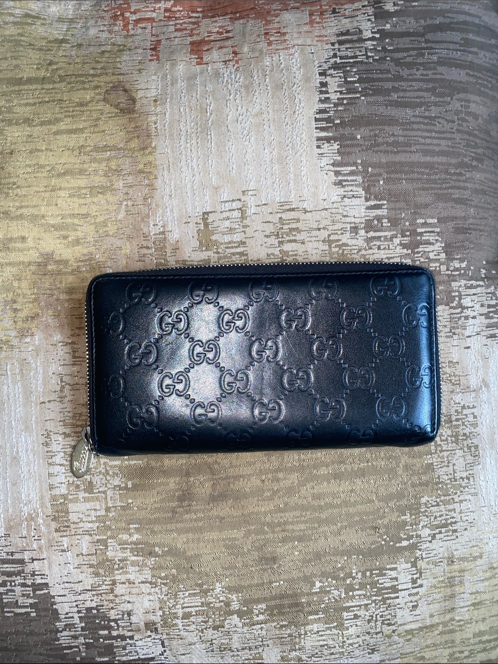 Authentic Gucci Black Embossed GG Zip Wallet with Gold Zip Pull